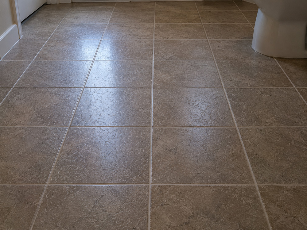 Pool deck tile before anti-slip treatment in Winter Garden, FL